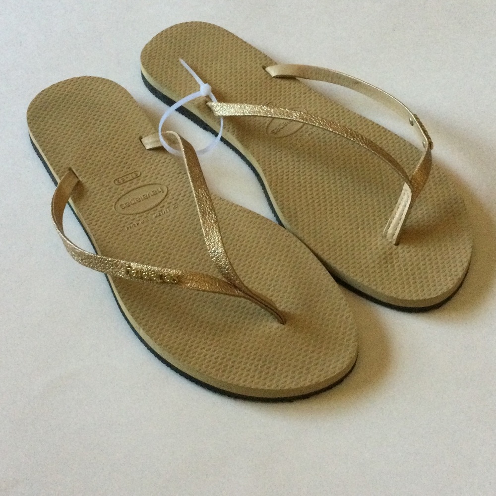 HAVAIANAS WOMENS GOLD SPARKLE FLIP FLOPS SIZE 11/12 NWOT